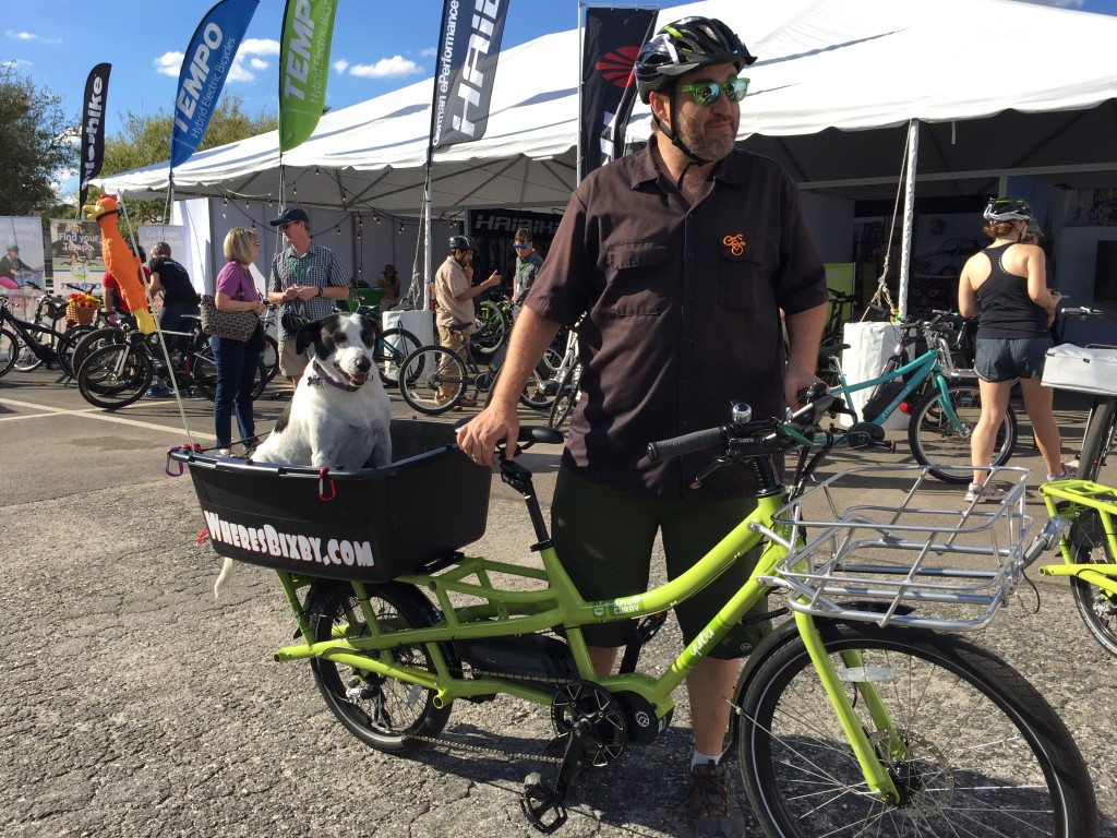 Bixby, her human and their Yuba Spicy Curry electric cargo bike