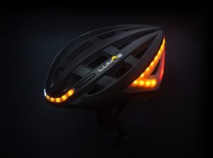 Bicycle helmet with built in online lights