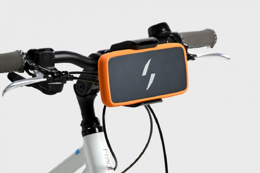 Swytch eBike Conversion Kit Orange Power Pack on Handlebars