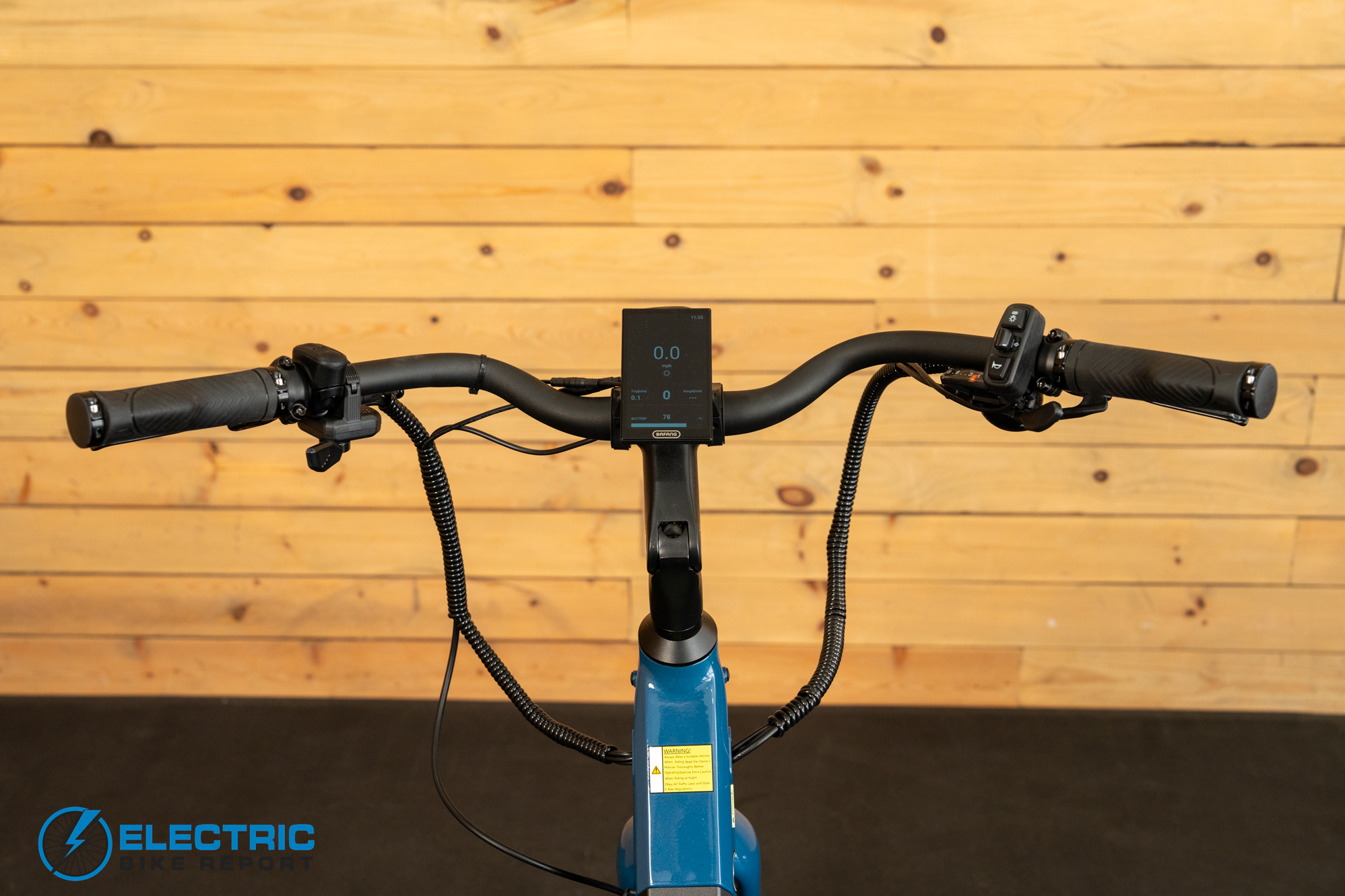 AIMA Key West 2.0 electric bike cockpit with handlebar controls and display
