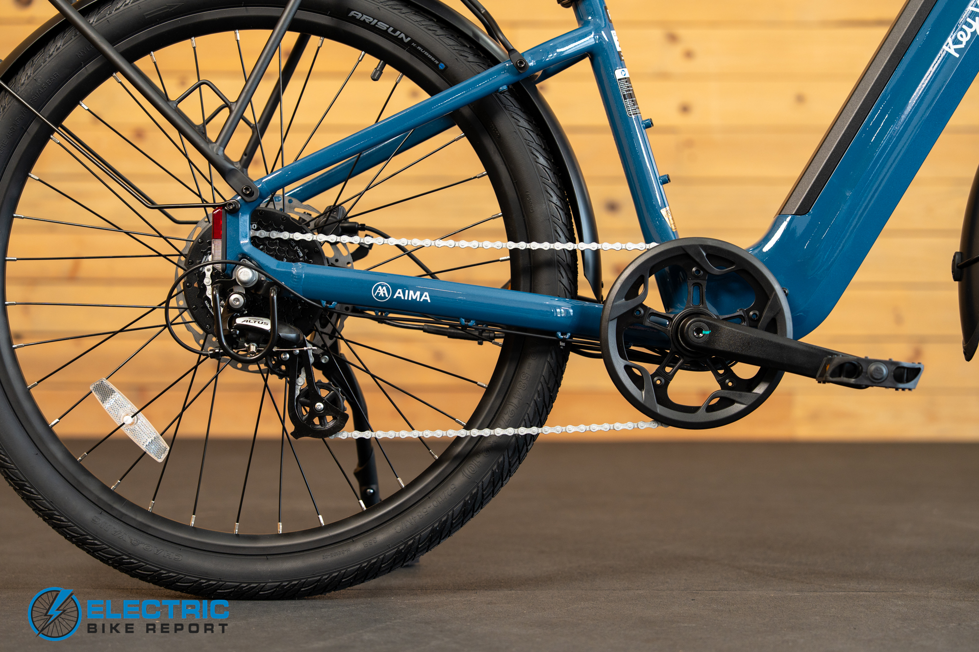 AIMA Key West 2.0 electric bike drivetrain components including motor chain and rear cassette