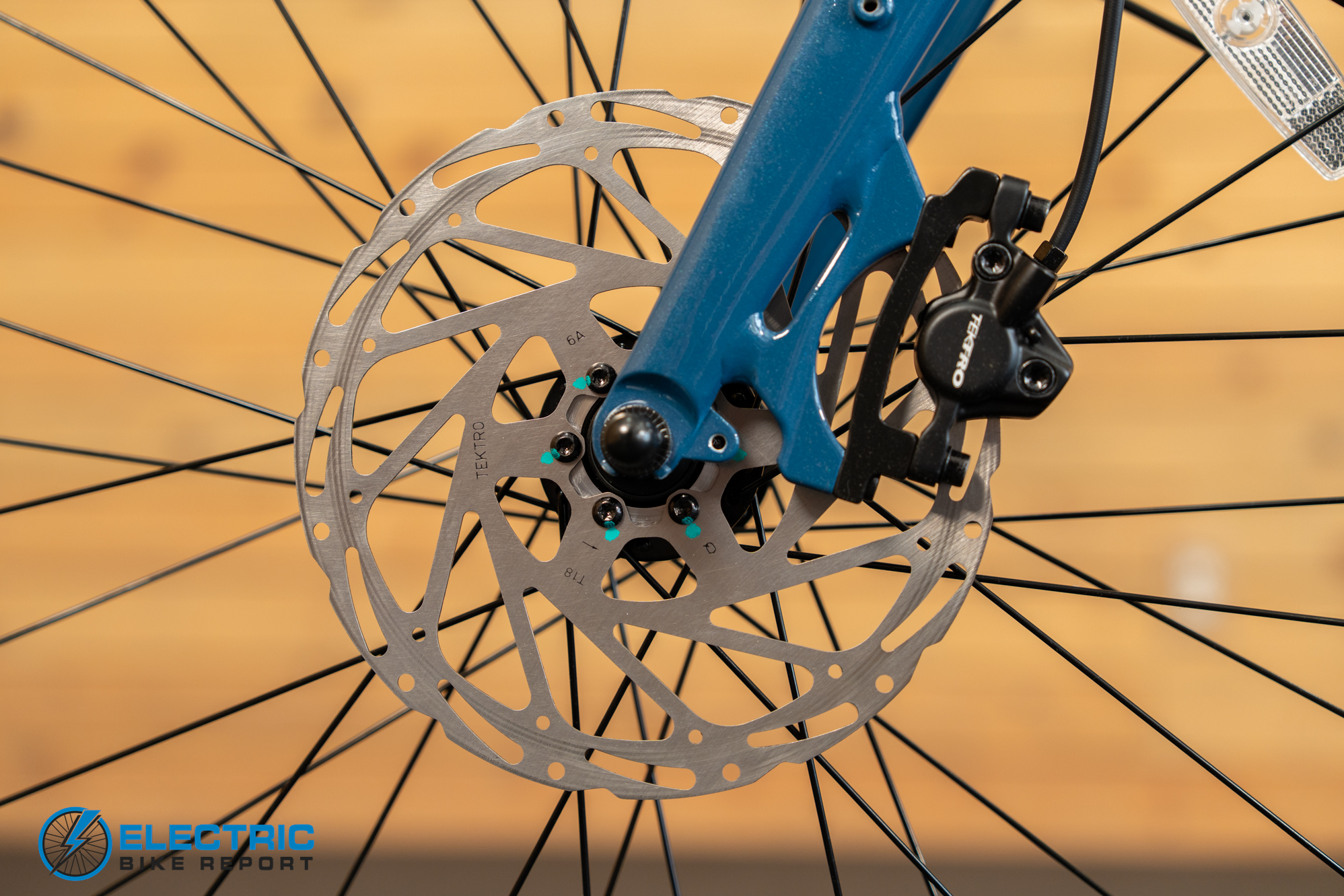 AIMA Key West 2.0 electric bike front brake caliper close-up detail