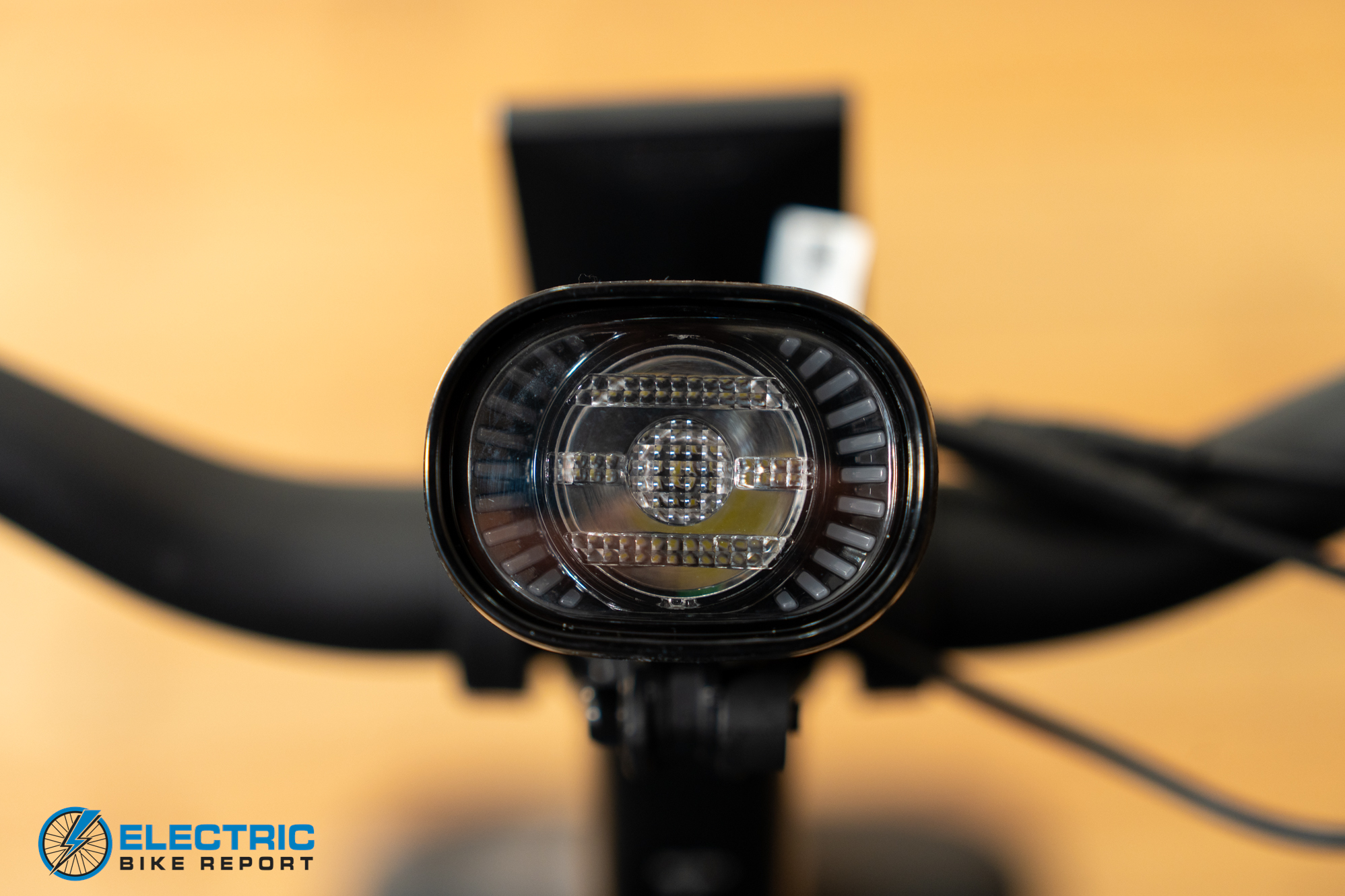 AIMA Key West 2.0 electric bike front headlight detail close-up