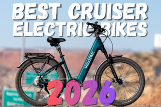 Blue electric cruiser bike with bold white 'Best Cruiser Electric Bikes' text and large pink '2026' overlay over a desert backdrop, likely a cover image.
