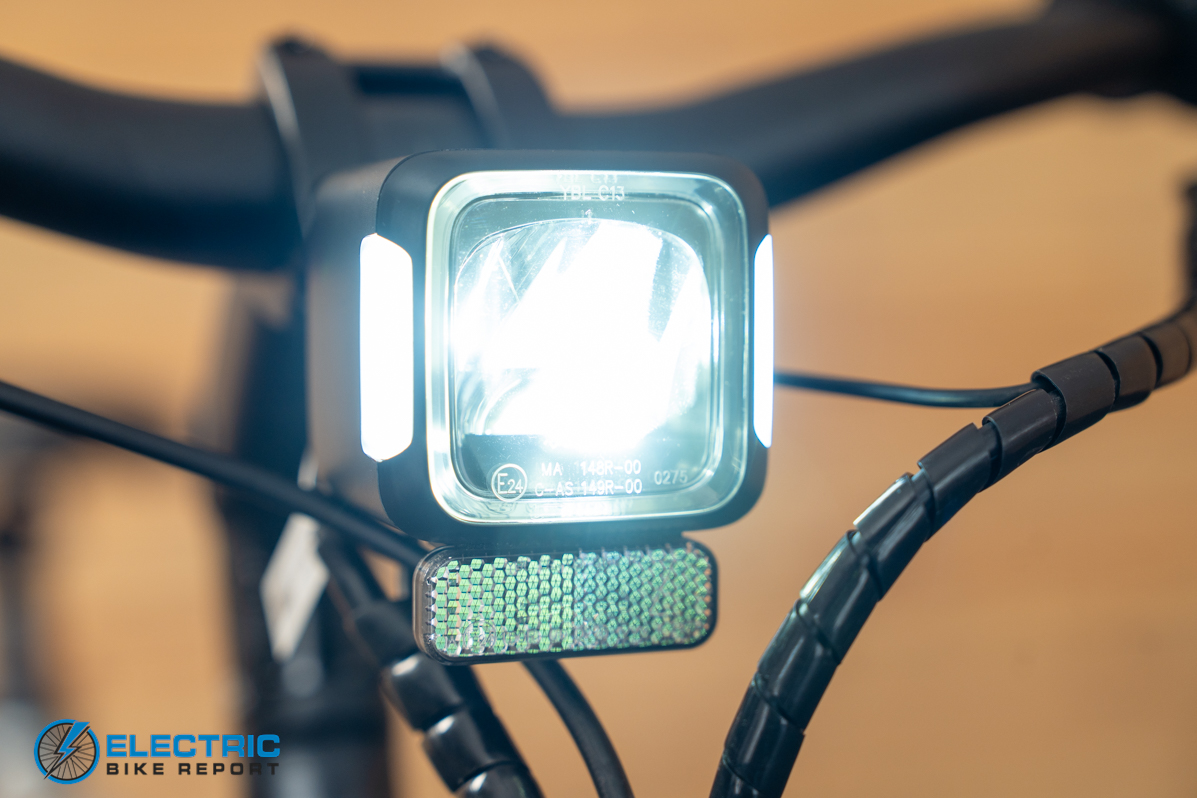 Cikada Urban Cruise electric bike headlight illuminated front lighting detail