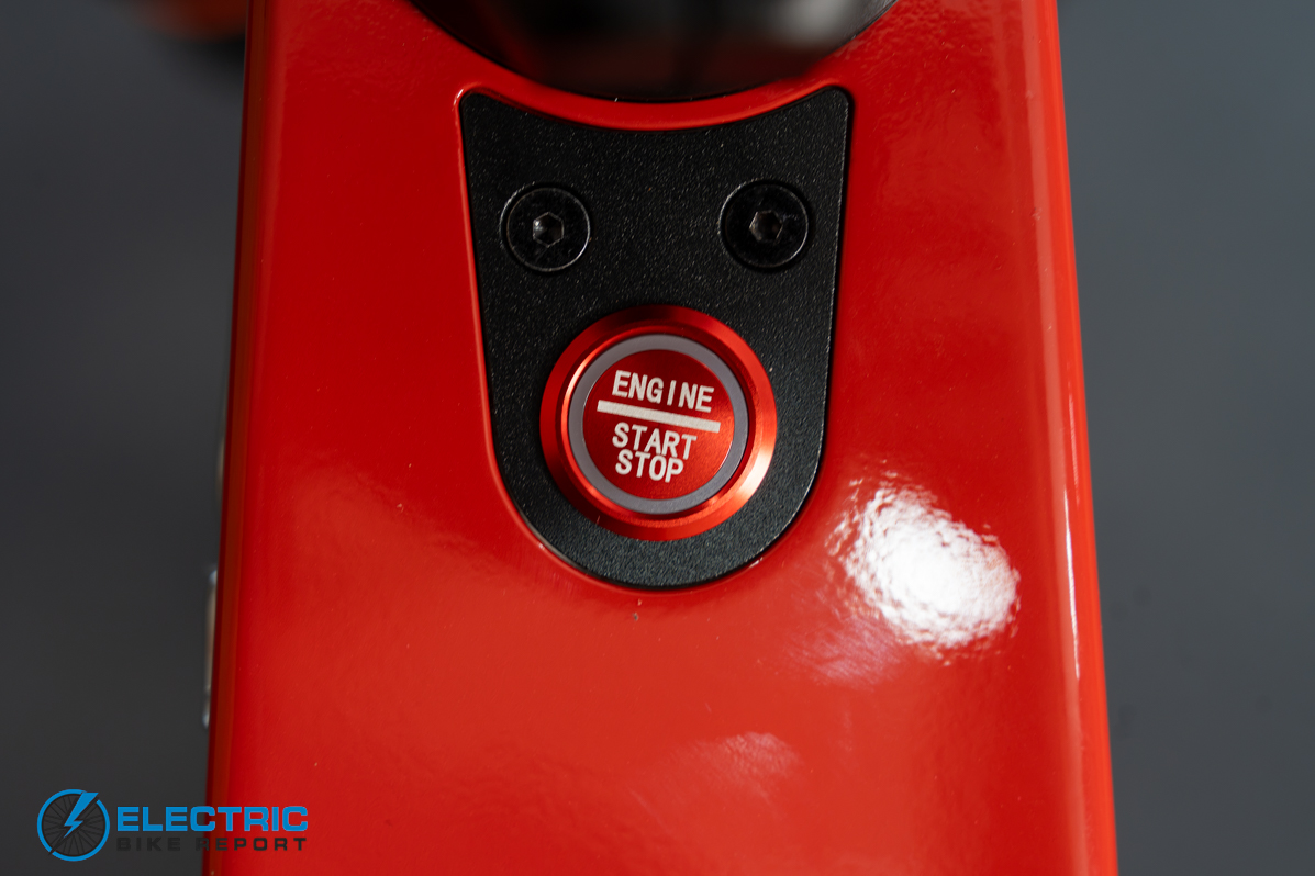 N+ Ford Mustang electric bike power button close-up detail