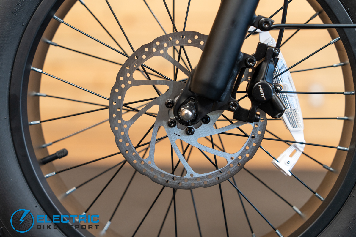 GoTrax F3 front hydraulic brake lever and Calibur fork detail close-up