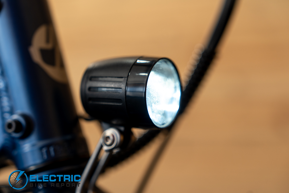 GoTrax E-Fold electric bike headlights illuminated during a nighttime or low-light riding test