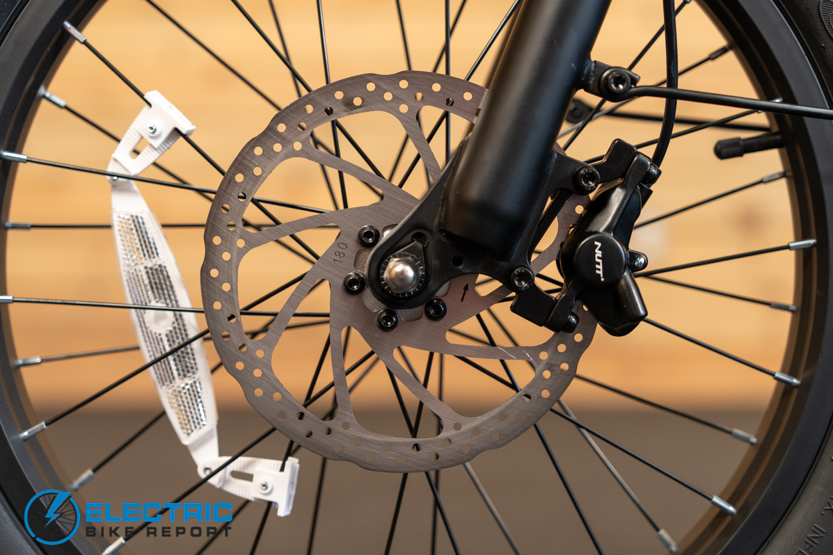 GoTrax F2 electric bike front brake caliper detail close up