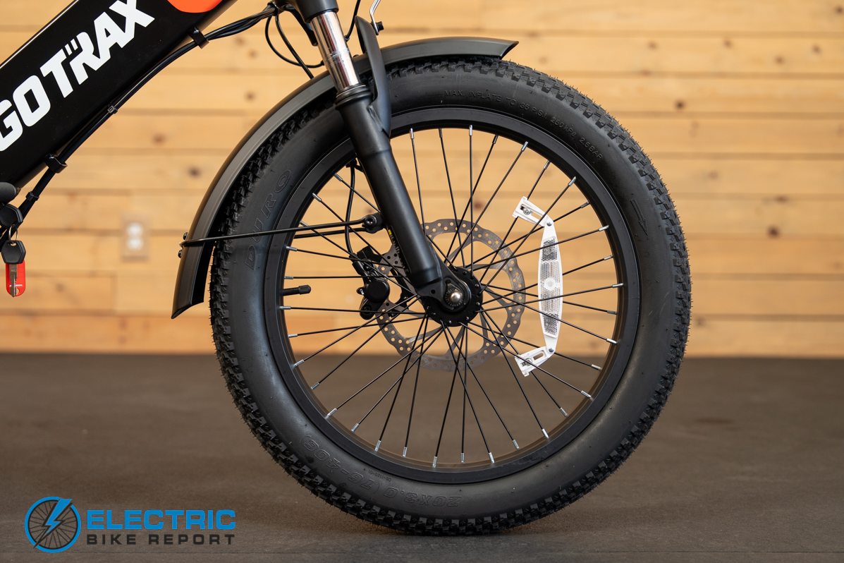 GoTrax F2 electric bike front wheel close-up detail view