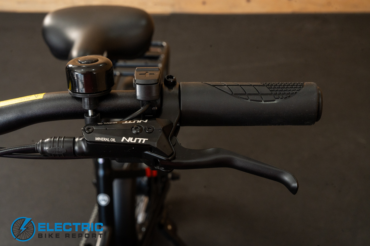 GoTrax F2 electric bike left side handlebar and front controls close-up view