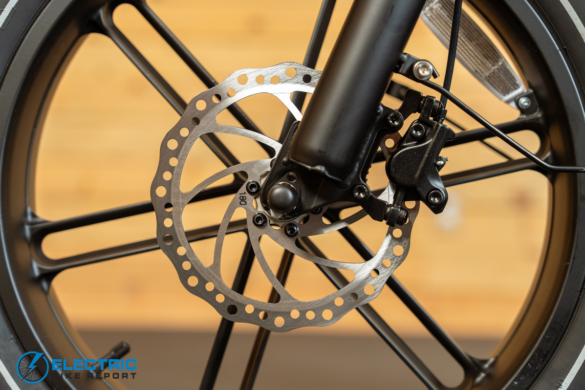 Heybike Titan white electric bike front brake caliper close-up detail