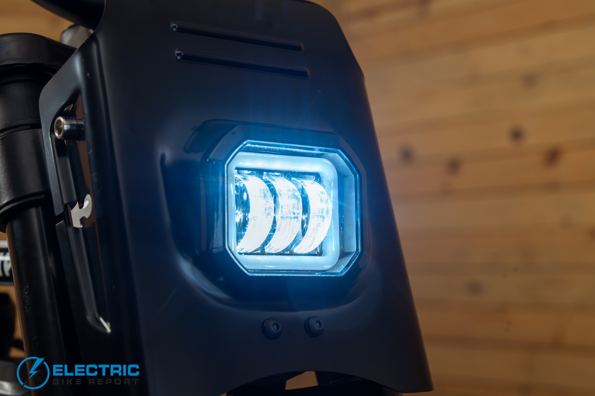 Heybike Titan white electric bike headlight illuminated front view