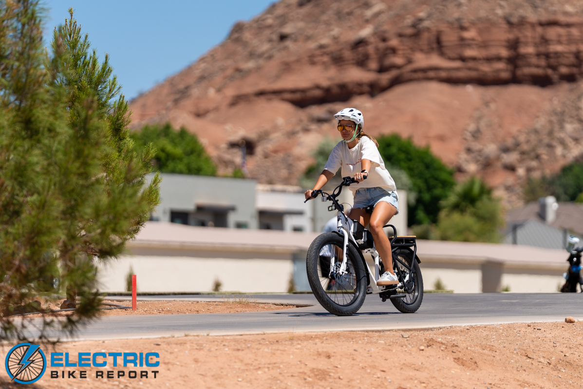 JackRabbit MG Cargo electric cargo bike in action shot showing rider in motion