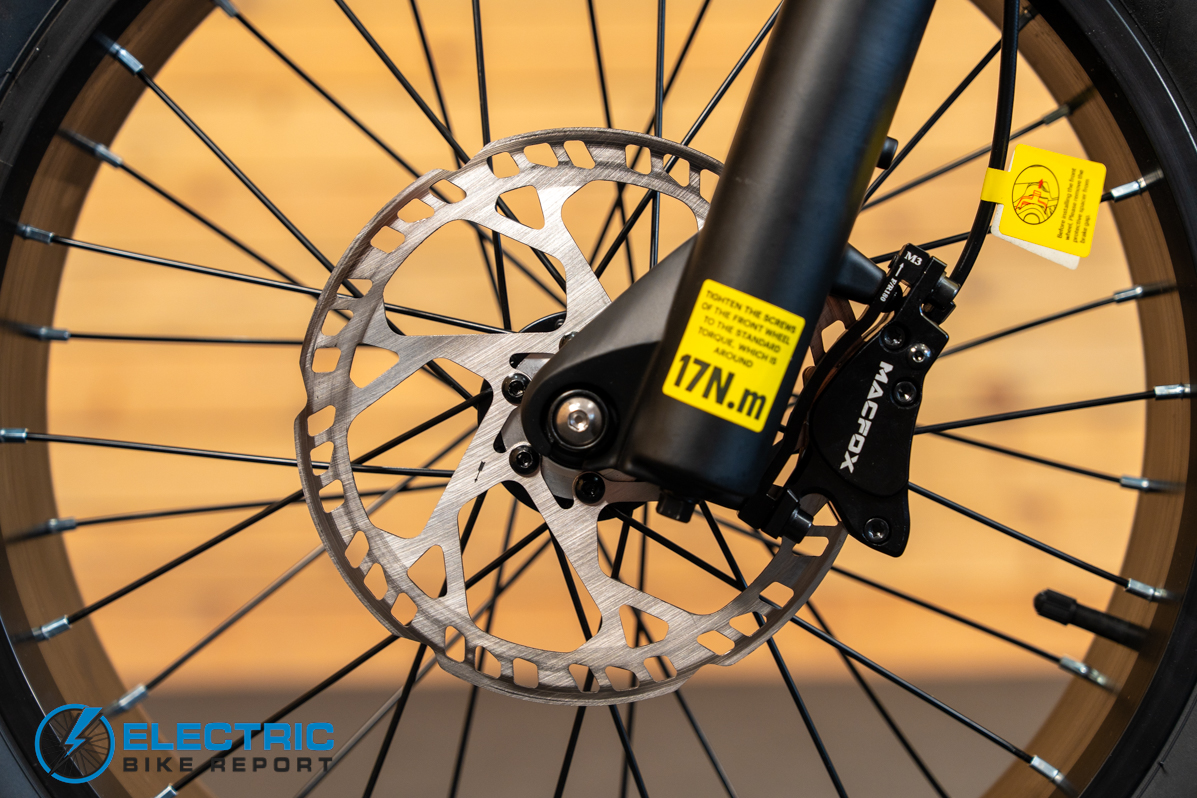 Macfox X7 electric bike front brake caliper close-up detail