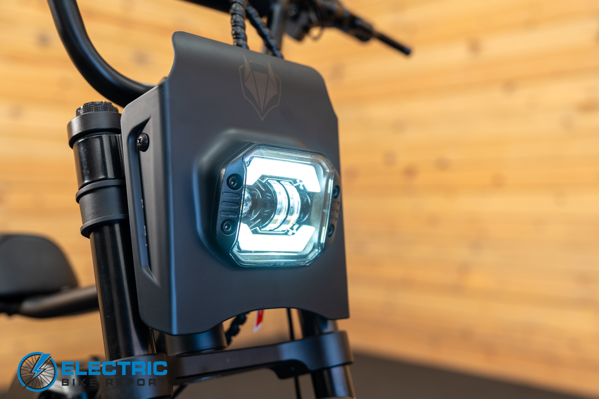 Macfox X7 electric bike headlight illuminated during review