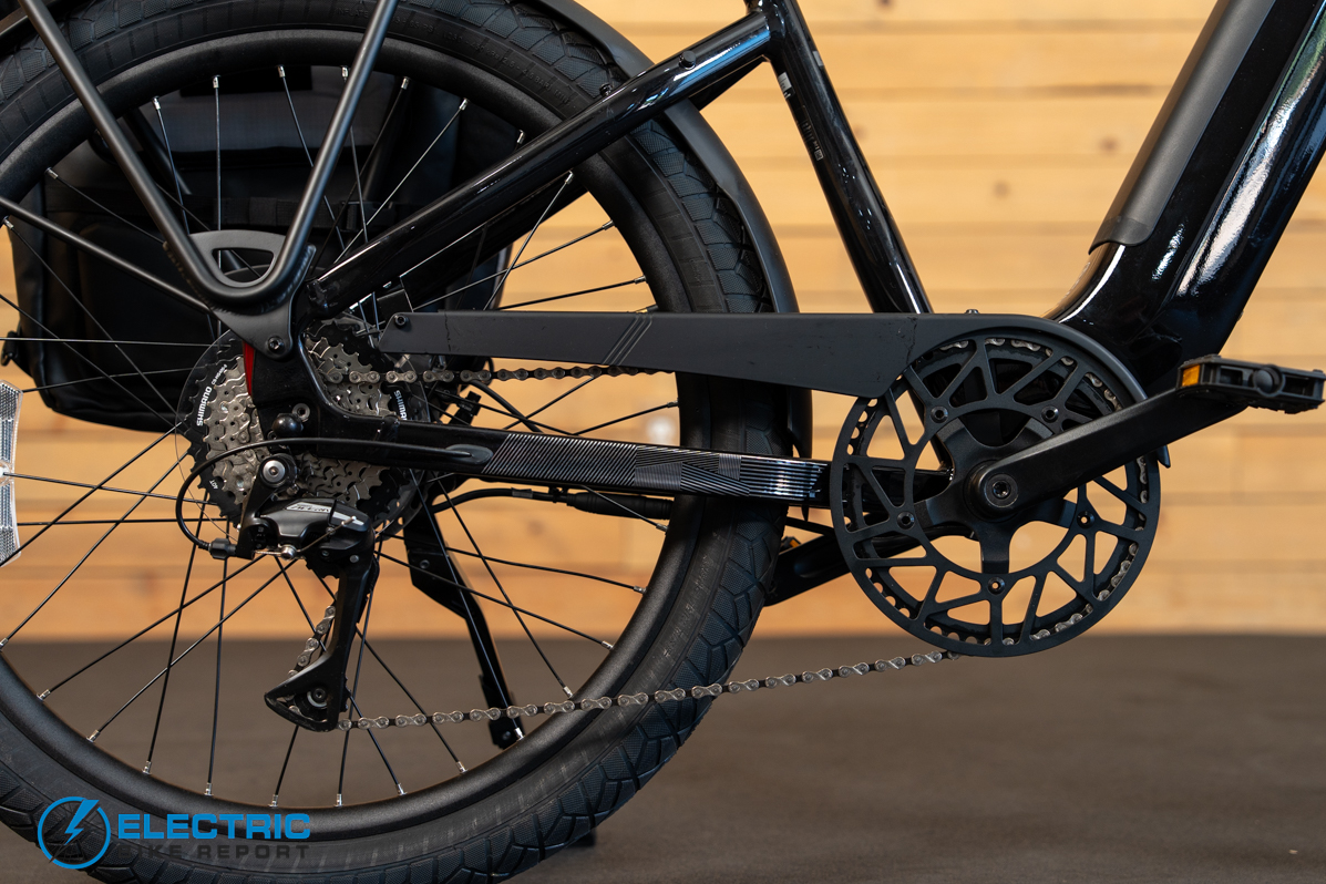 Momentum Vida E+ EX electric bike drivetrain components including motor chain and gearing system