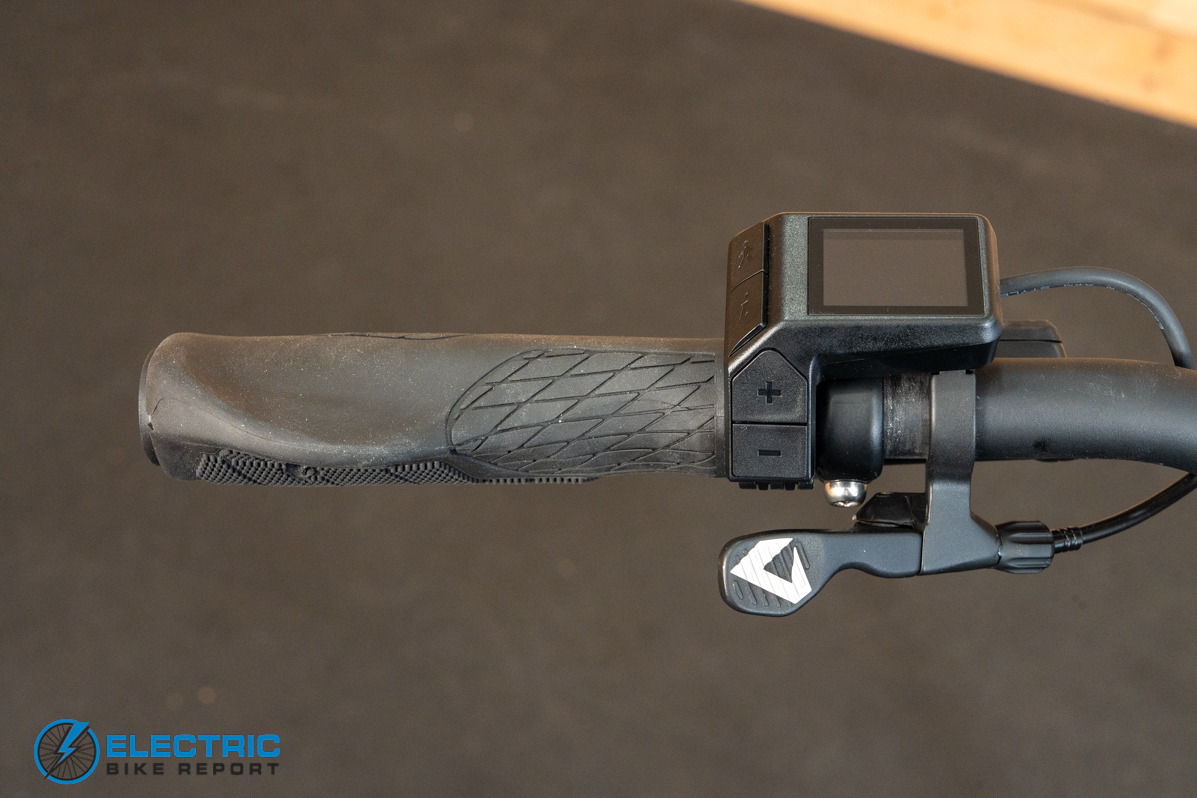 Momentum Vida E+ EX left side handlebar controls and rear view detail