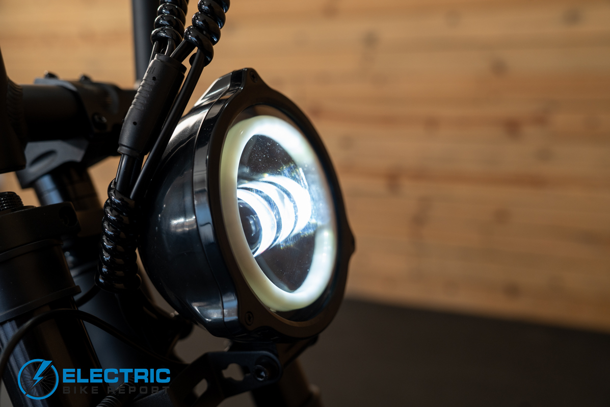 PEDAL AWD electric bike headlight illuminated front view