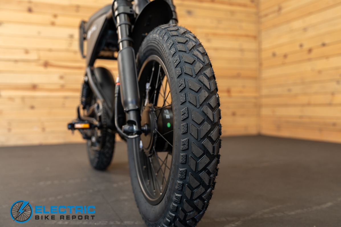PEDAL AWD electric bike knobby tire tread pattern close-up detail