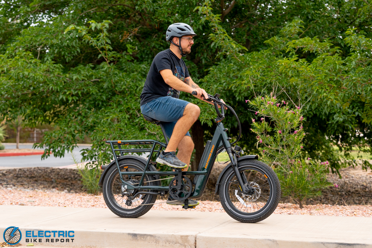 Rad Power Bikes RadRunner Max electric utility bike riding on a path action shot