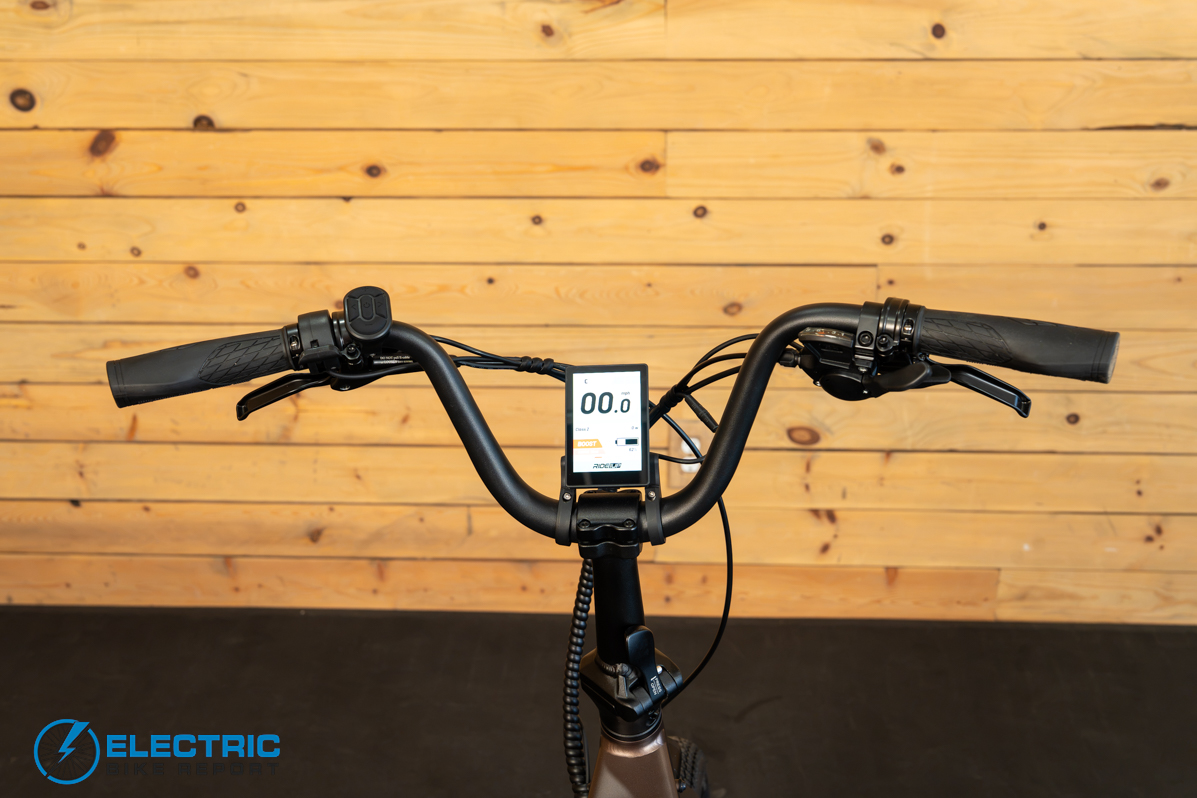 Ride1Up Portola cockpit close-up showing handlebars display and controls
