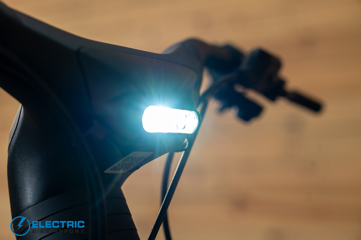 Specialized Turbo Vado 3.0 5.0 integrated headlight illuminated on the front of the e-bike
