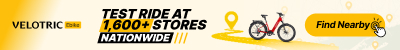 Velotric ad banner: 'Test ride at 1,600+ stores nationwide' with a bike graphic and a 'Find Nearby' button.