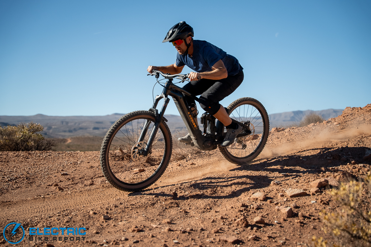 Trek Rail Plus 8 electric mountain bike action shot rider in motion on trail