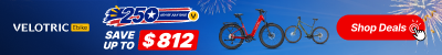 Velotric promotional banner featuring bicycles, a bold discount offer up to $812, and a red Shop Deals button.